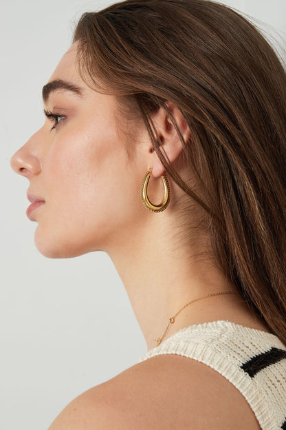 druppel vormige oorbel met schakkels