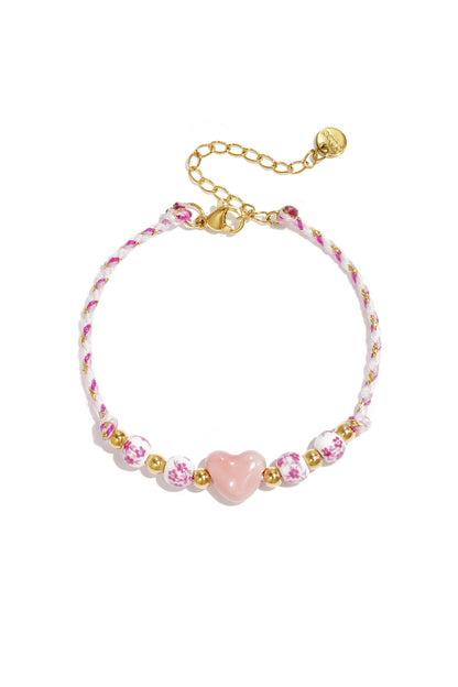 Gevlochten armband met kralen met design en hart