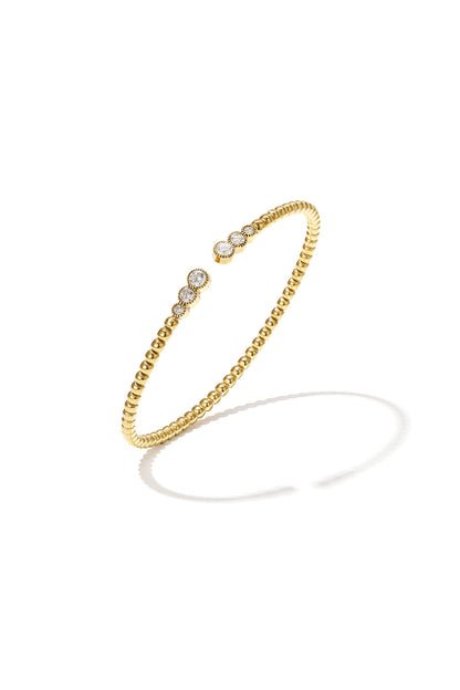 Symmetrisch gestipte bangle met gedetailleerde uiteinden
